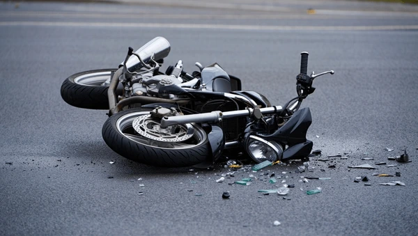 dramatic-motorcycle-accident-scene-showcasing-600nw-2625088199